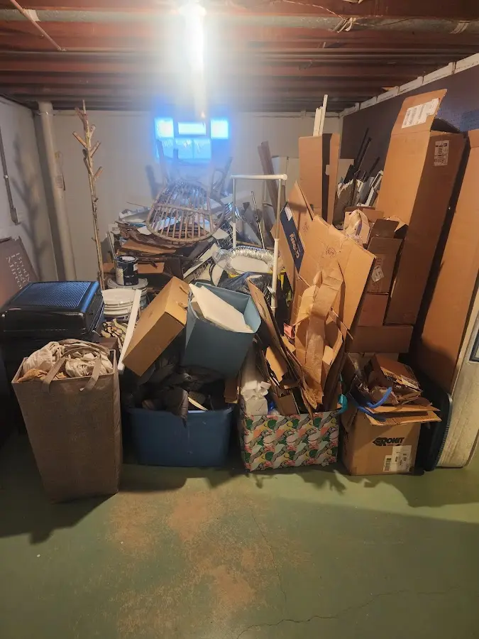 Roll-off dumpster container at job site for 2 Yard Dumpster Rental in Landis